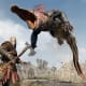 A giant crocodile leaps at Kratos in God of War Ragnarok.